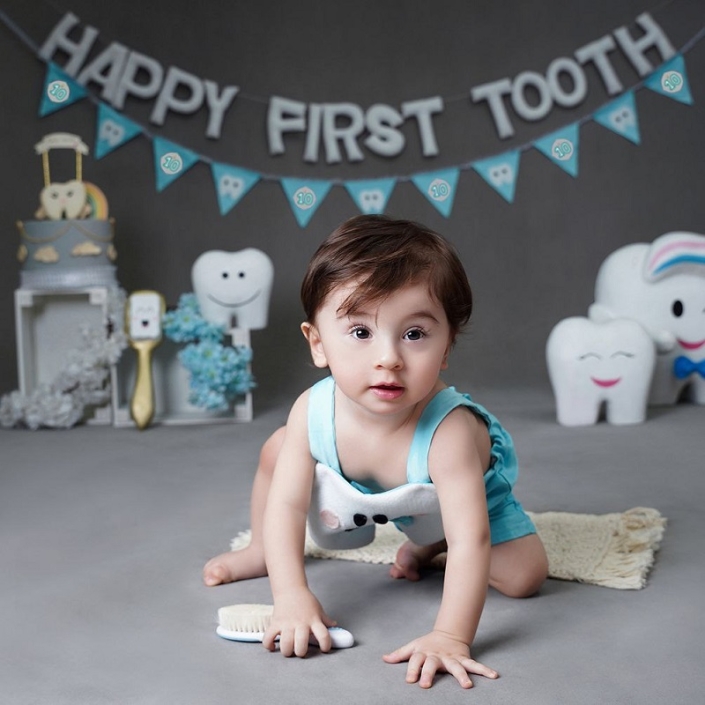 عکس اولین دندان در شهرک ژاندرمری | عکاسی کودک مهناز
