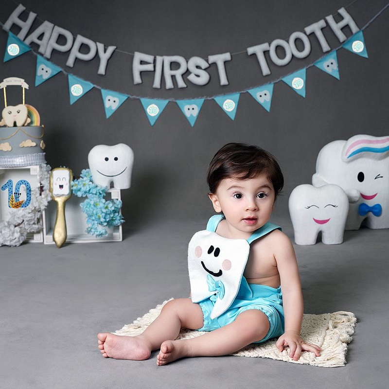عکس اولین دندان در شهرک اوج | عکاسی کودک مهناز